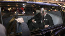 A protester bangs on the window of the car carrying Britain's Prince Charles and Camilla, Duchess of Cornwall, in London, Thursday, Dec. 9, 2010. Angry protesters in London have attacked a car containing Prince Charles, the heir to the British throne, and his wife Camilla, Duchess of Cornwall. An Associated Press photographer saw demonstrators kick the car in Regent Street, in the heart of London's shopping district. The car then sped off. Charles' office, Clarence House, confirmed that 'their royal highnesses' car was attacked by protesters on the way to their engagement at the London Palladium this evening, but their royal highnesses are unharmed.'